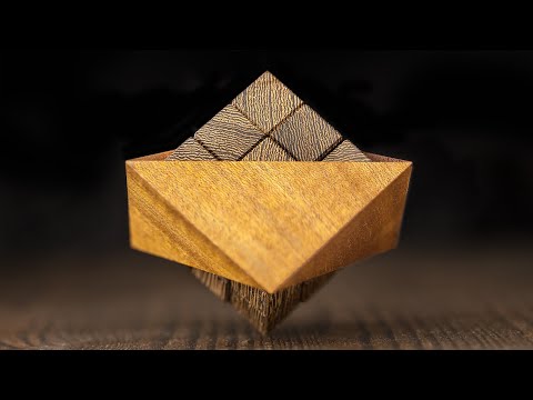 Beautiful Triangle ring 3 puzzle by Osanori Yamamoto and Pelikan.