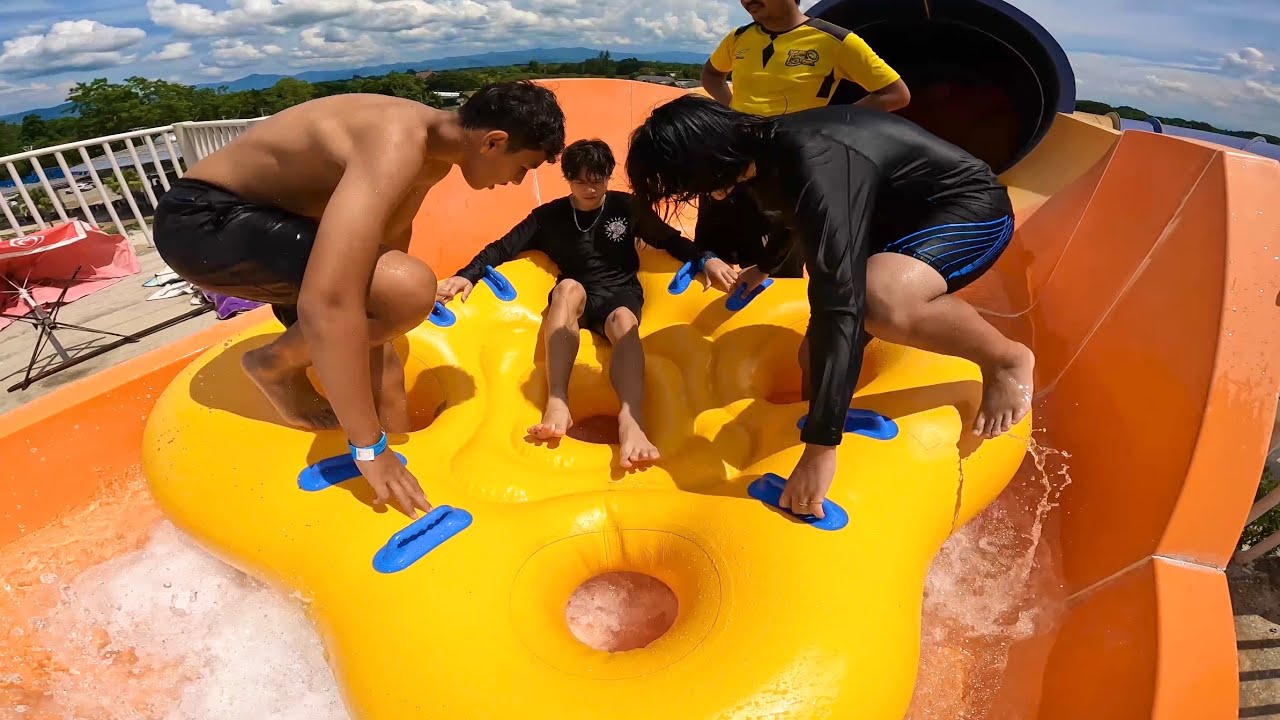 Experience the Thrill of All Water Slides at Chiang Mai's Tube Trek Waterpark, Thailand!