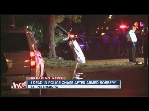 One dead after suspected armed robbers crash during police chase