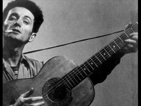 Tear the fascists down - Woody Guthrie