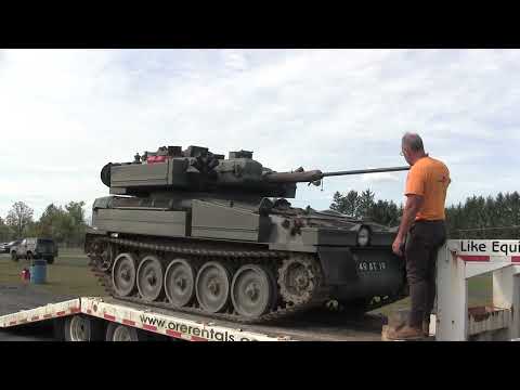 British Alvis CVR(T) Sabre light tank getting loaded after red ball military vehicle show 2025