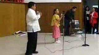 Celine and Jordan Rockin' Around the Christmas Tree