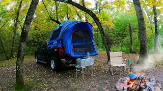 Truck Tent Camping in the Woods
