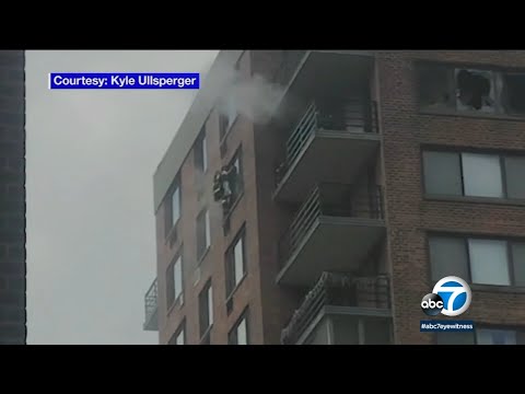 FDNY uses rare rope rescue to save woman from side of burning building | ABC7