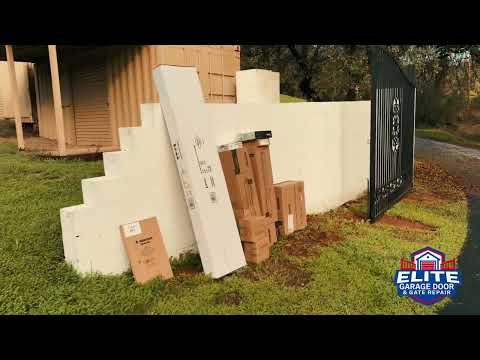 Elite Garage Door & Gate Repair technician completing a garage door repair job in Cameron Park