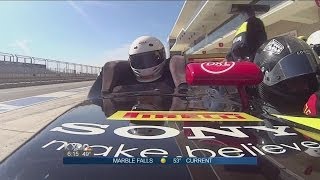 Meteorologist David Yeomans takes a spin in an F1 car