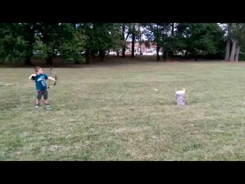 7 year old shooting bow