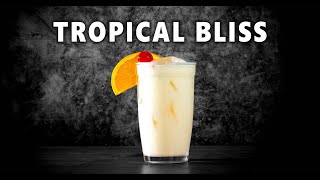 Escape to Paradise with This Tropical Bliss Cocktail 🌴🍍