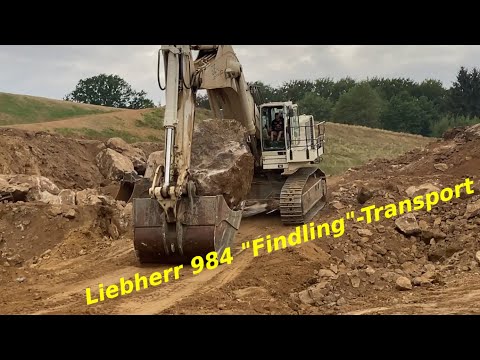 Liebherr 984 - Lösen einer 30 Tonnen Felsnase und Transport