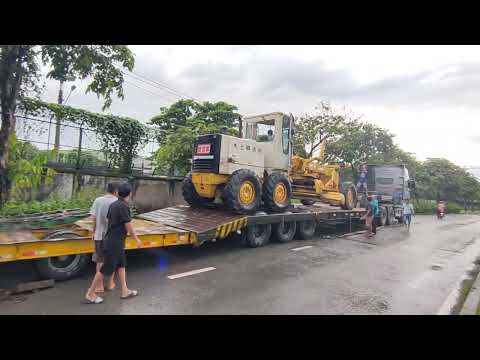 Thủ tục hải quan, vận chuyển Máy san đất MITSUBISHI MG430