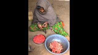 preview picture of video 'Village Lady preparing carrots for dinner'