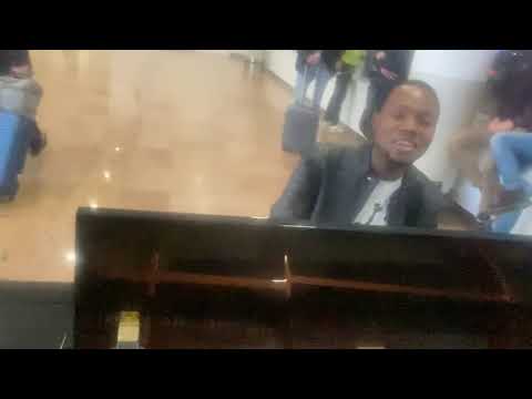 LANDRY MONGALI  à l’aéroport de Bruxelles Zaventem en route Pour Washington Seattle