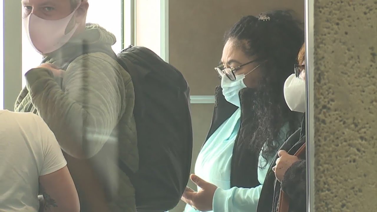 Travelers at KCI have mixed views on masks being optional on public transportation