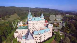 A beautiful aerial establishing view over the rooftops of the romantic Bojnice Castle in Slovakia