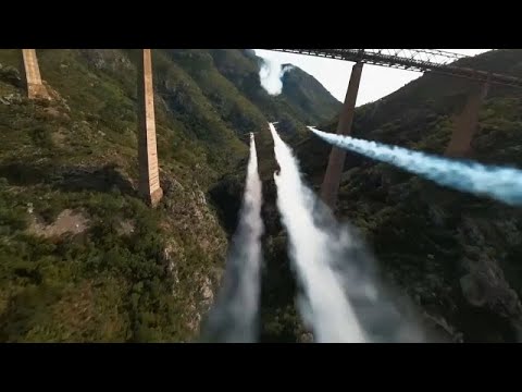 Acrobatic aircraft defy gravity in world-first loop under Montenegro’s tallest bridge