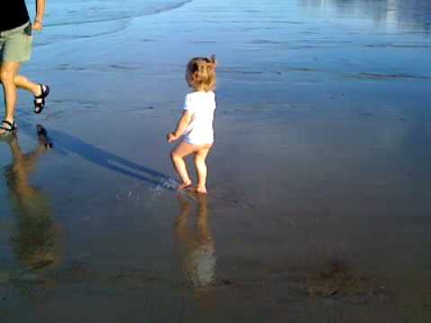 Lilyana exploring the surf