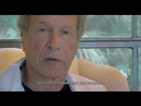 Let's make MONEY - The Economic Hit Man Video-Thumbnail von YouTube