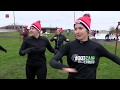 Ploeteren in de blubber bij obstakelloop in Biddinghuizen.