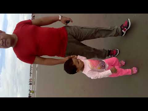 Maisha & her father walking at cox beach