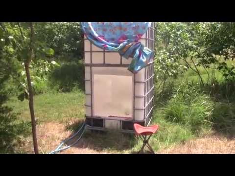 Off grid outdoor ibc container solar shower.