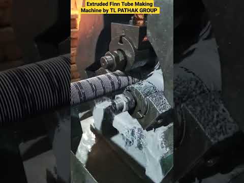 Extruded fin tube making machine