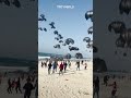 Palestinians In Gaza Rush To Receive Airdropped US Aid
