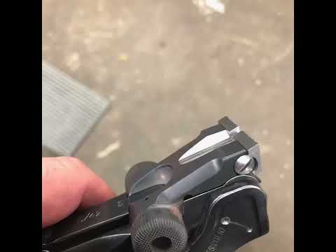 Luger 9mm pistol, custombuilt to her demands.