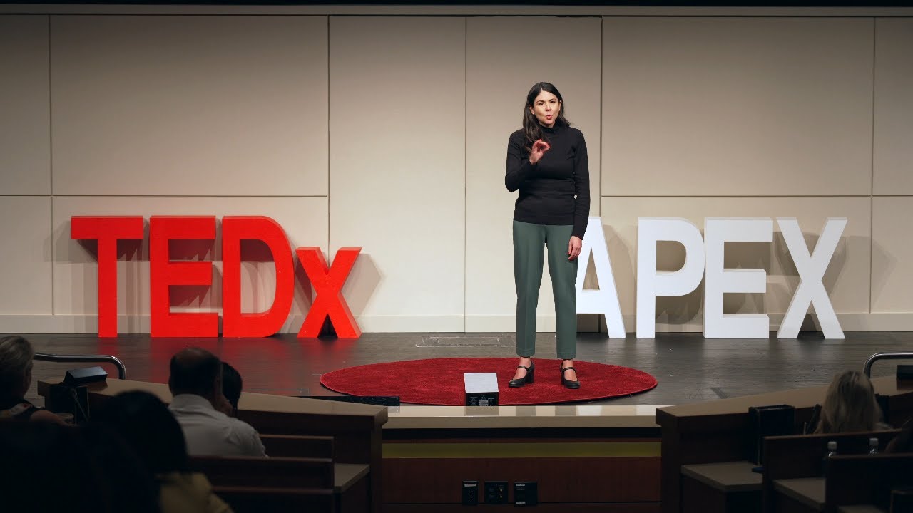 Candice Thompson on the TEDx Apex stage