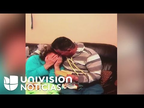 A Hispanic couple's emotional reaction to receiving their green cards this Christmas