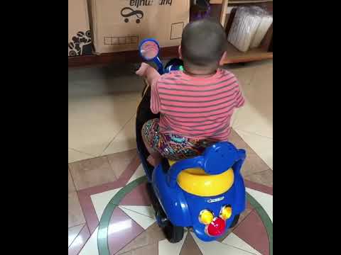 Tatan riding minion bike