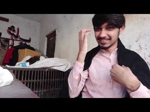 Wearing a black shawl and sitting on shop