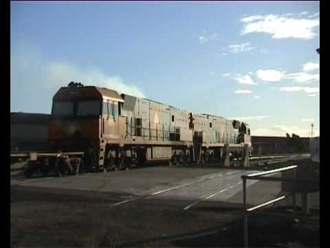 NR83-NR97 departing  Intermodal Yard South Dynon 19/10/03