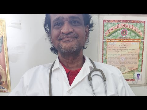 Medical Doctor reviewing Vision Loss Case Study at SVS Mani Acupuncture