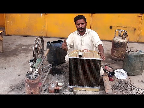 The Skilled Man Brilliantly Fixing A Car Radiator
