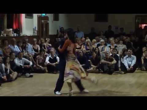  Joachim Dietiker  and  Michelle Marsidi  are  dancing  to  a  vals  at  England International Tango Festival  in  2014