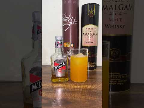 McDowell’s Orange 🍹 #cocktail #whiskey #drink #liquor #alcohol #mcdowells #amrut #brandy #rum #like