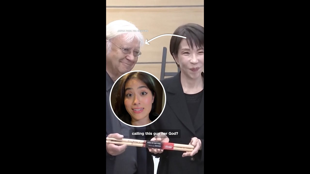 Japanese PM fangirls while meeting rock band