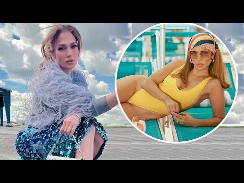 Jennifer Lopez turned up the heat in a bright yellow swimsuit to promote Delola cocktail