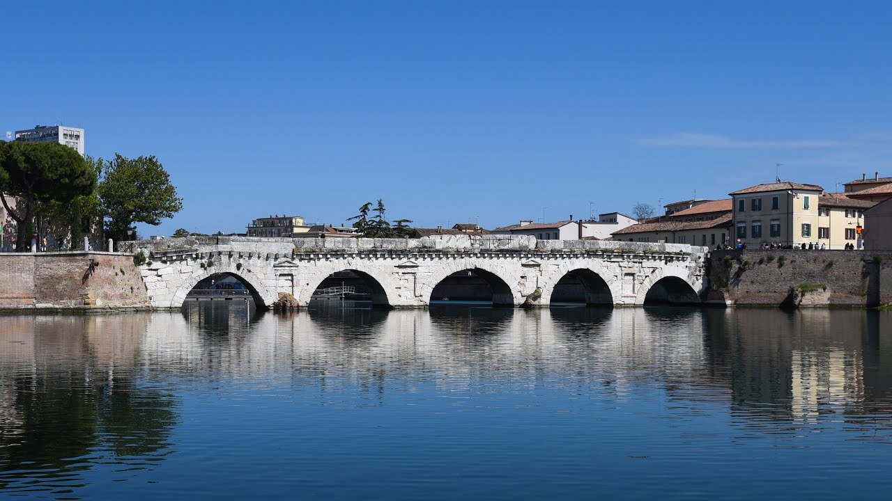 Immersive street-level walking tour through Rimini Tiberius Bridge, Italy, showcasing authentic urban landscapes, local architecture, and the vibrant atmosphere of the city's neighborhoods