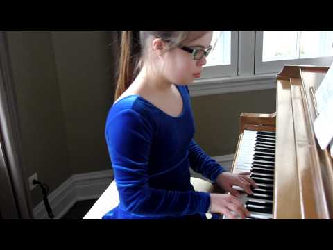 Lauren Miller Playing the Piano - Lauren has Down Syndrome