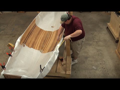 21 Applying fiberglass and Epoxy to the Inside of the Whitehall hull