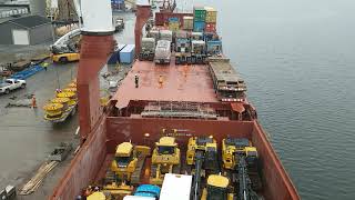 Typical break bulk vessel in loading cargo, good demonstration.