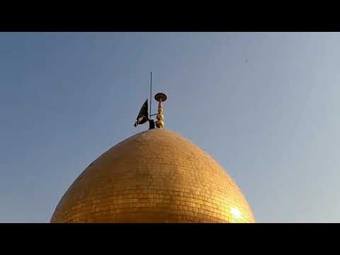 Flag changing at the shrine of Shah Abdul Azeem as