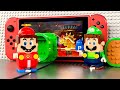 Lego Mario And Luigi Enter The Nintendo Switch Game To Save Peach From Bowser S Castle Legomario