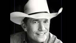 George Strait - 80 proof bottle of  tear stopper