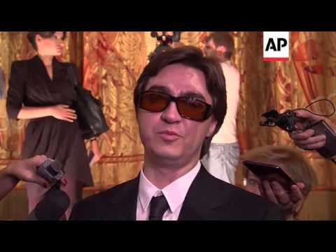 Artistic director injured in acid attacks returns to theatre for new season