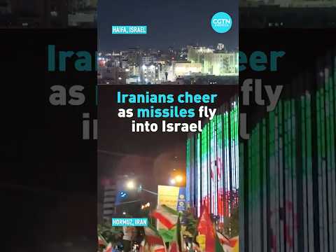 Iranians cheer as missiles fly into Israel