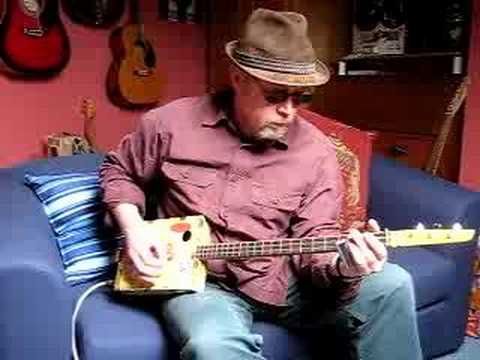 Delta blues improvisation on cigar box guitar