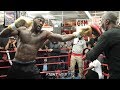 DEONTAY WILDER SHOWS INSANE POWER AS HE PUNCHES MITT CLEAN OFF TRAINER'S HAND!