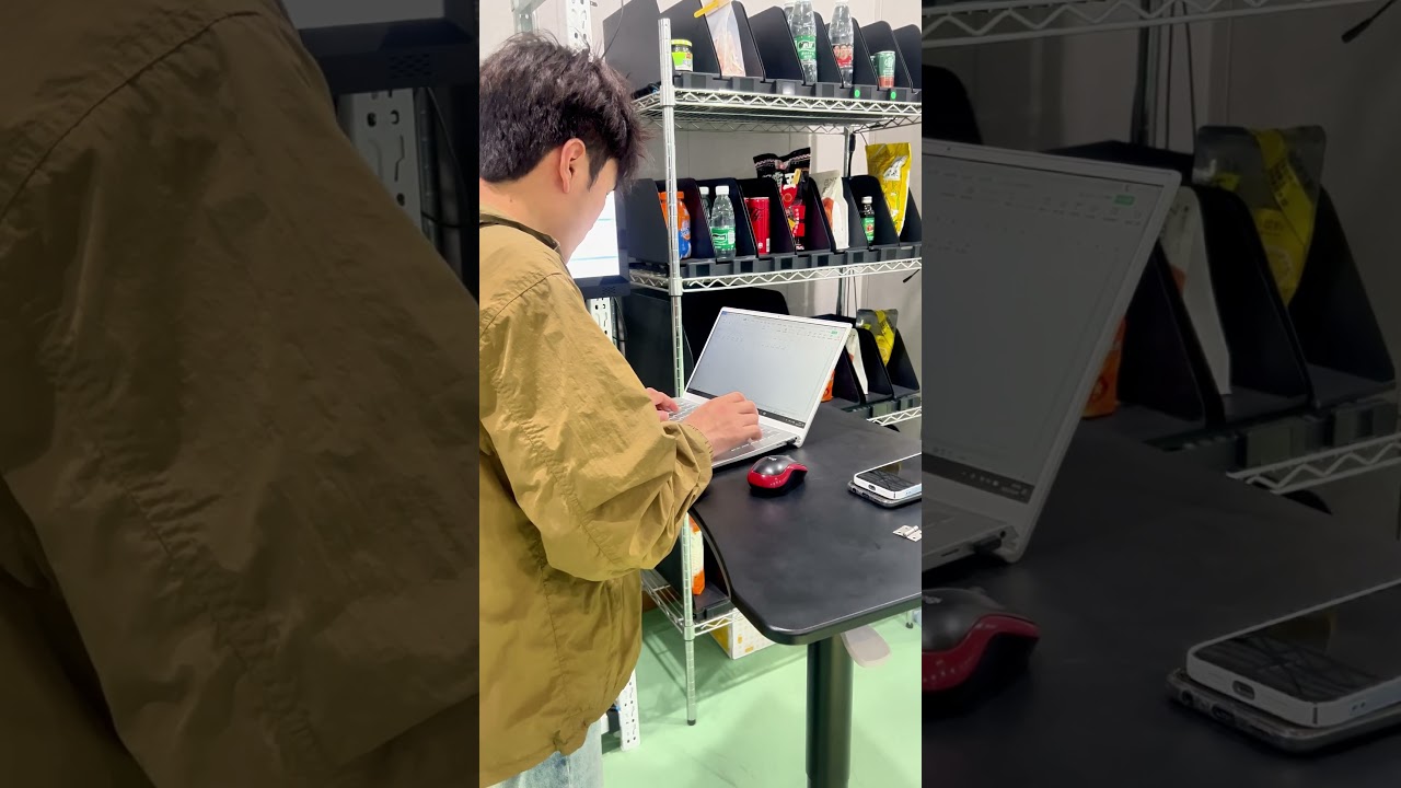 MonolithIoT Operation Maintenance Engineer is Performing Precise Calibration Tests on Smart Shelves